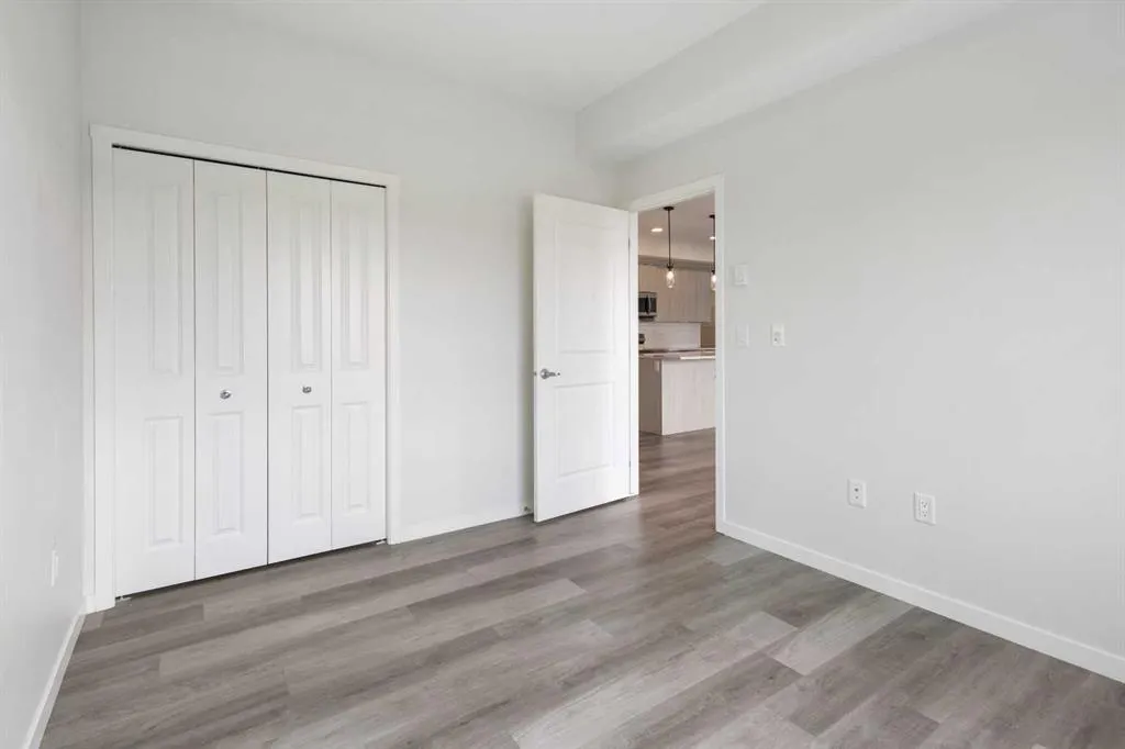 360 HEARVEST HILLS Way NE, #306