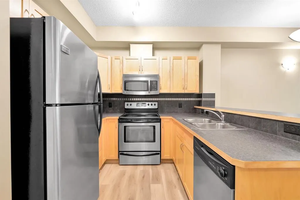 211 Aspen Stone Boulevard SW, #1103