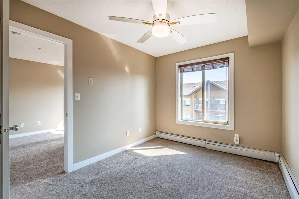 403 Mackenzie Way SW, #1407