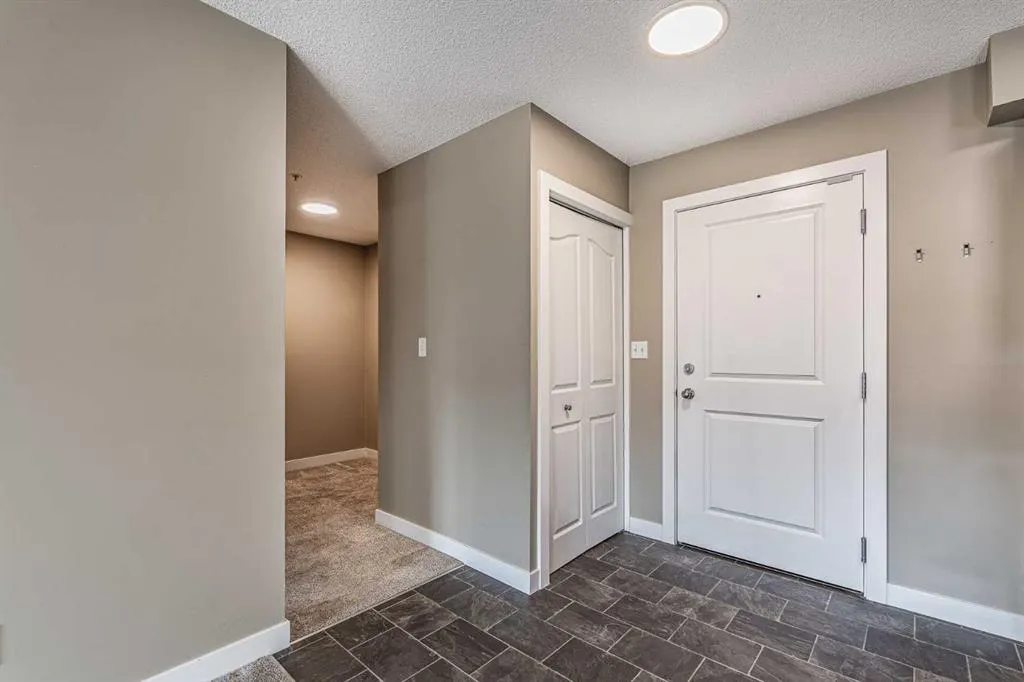 403 Mackenzie Way SW, #1407
