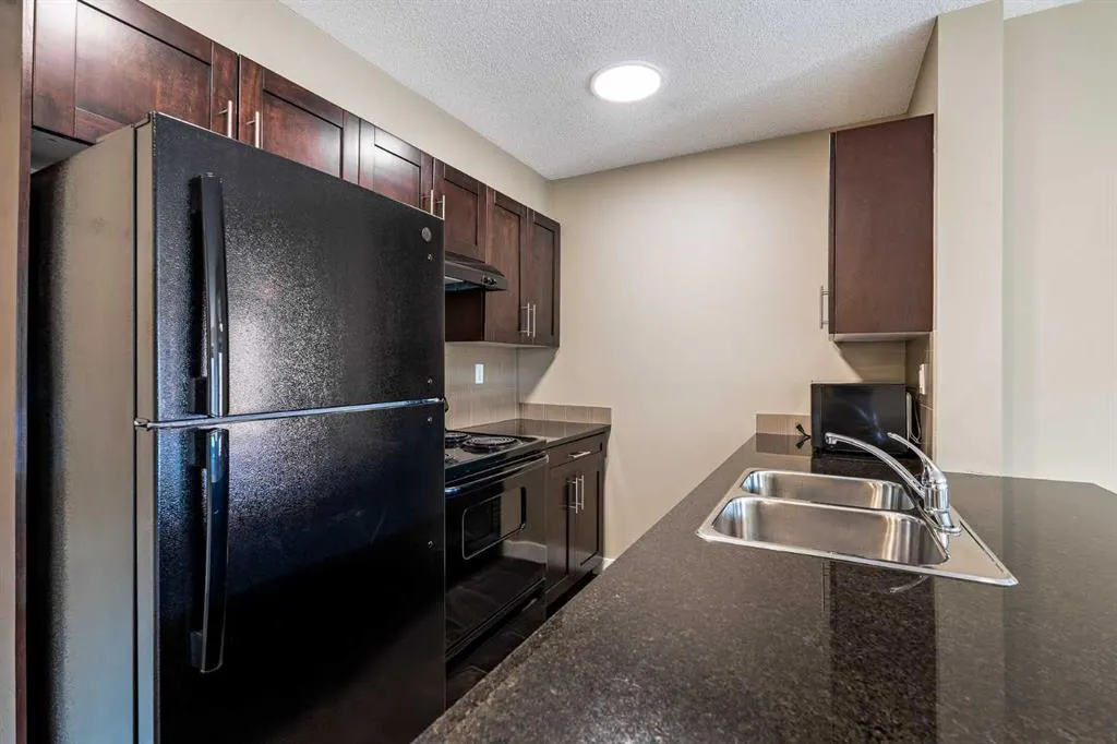 403 Mackenzie Way SW, #1407