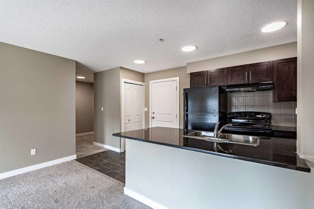 403 Mackenzie Way SW, #1407