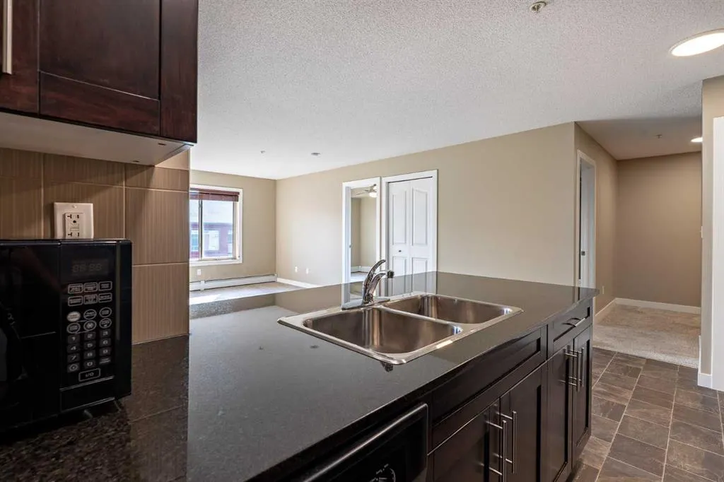 403 Mackenzie Way SW, #1407