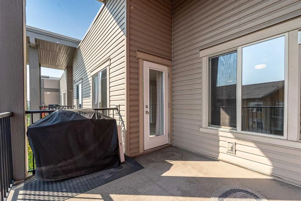 403 Mackenzie Way SW, #1407