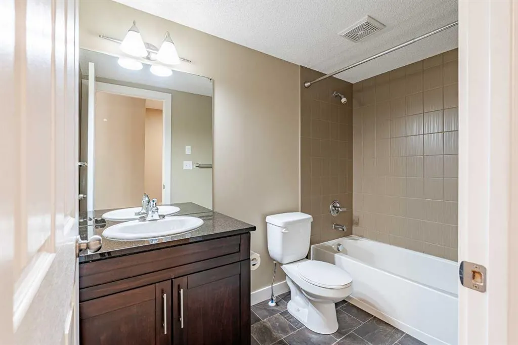 403 Mackenzie Way SW, #1407