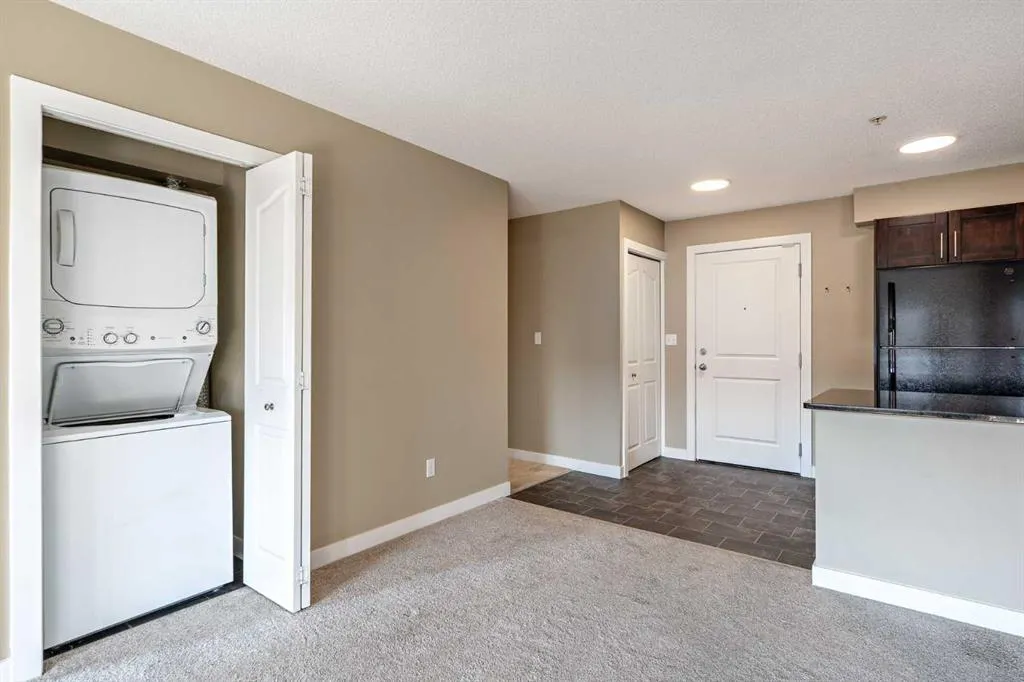 403 Mackenzie Way SW, #1407
