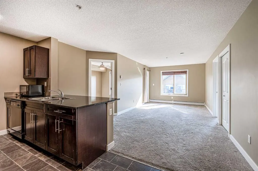 403 Mackenzie Way SW, #1407