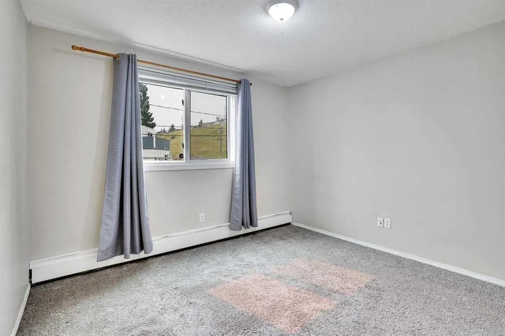 219 Huntington Park Bay NW, #103