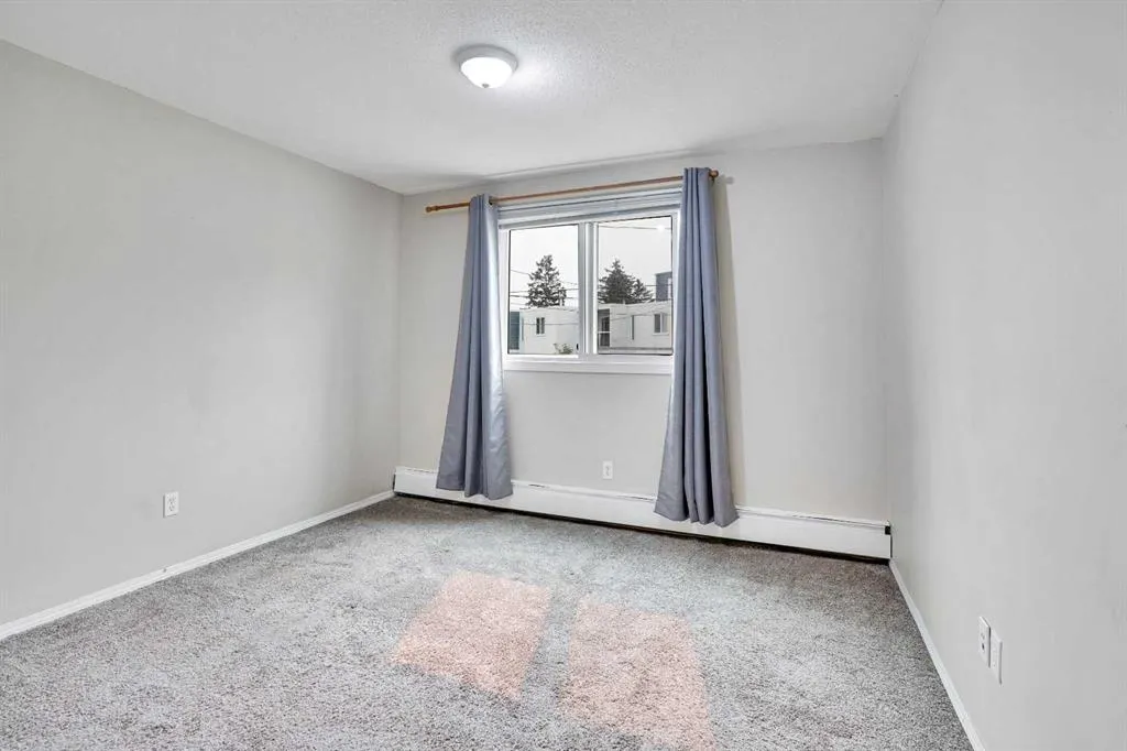 219 Huntington Park Bay NW, #103