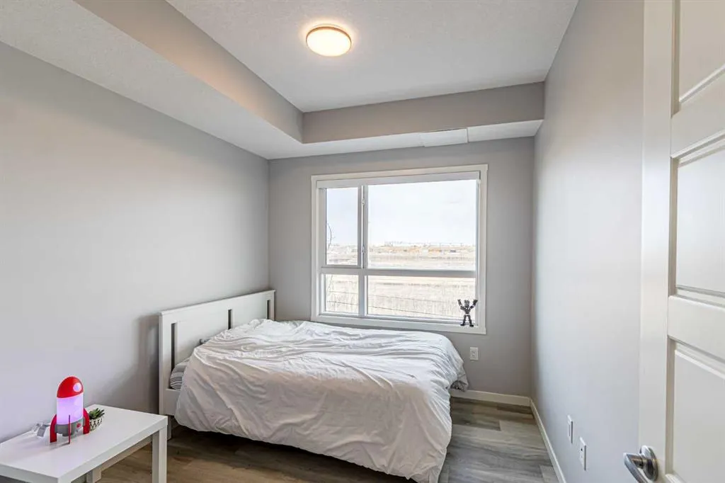 360 Harvest Hills Way NE, #203