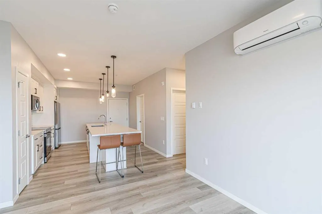 360 Harvest Hills Way NE, #203