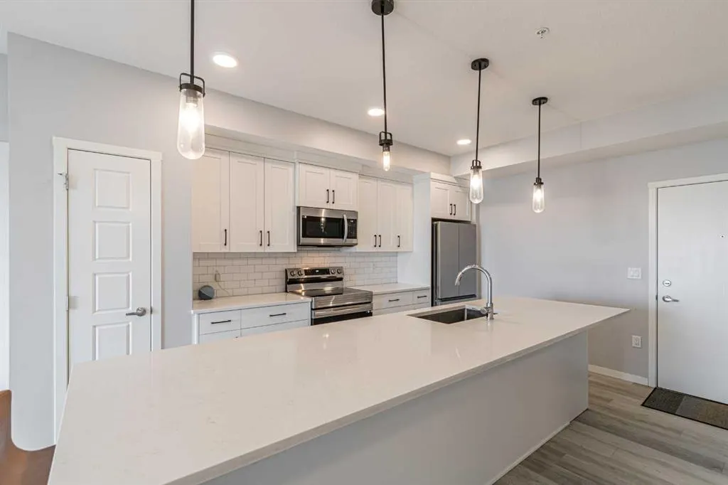 360 Harvest Hills Way NE, #203
