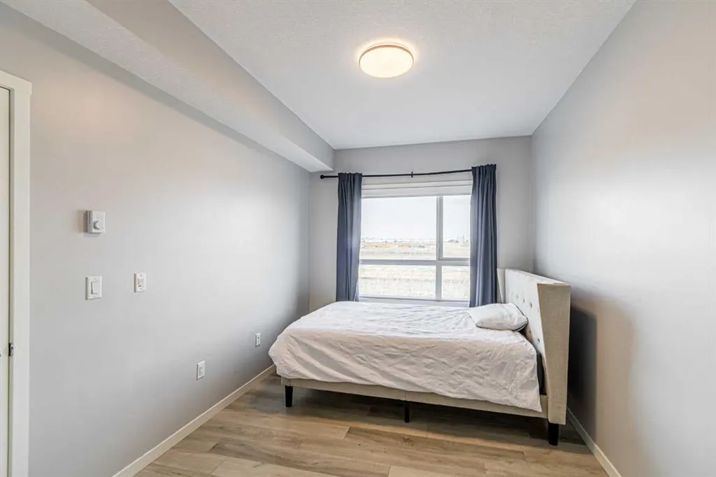 360 Harvest Hills Way NE, #203