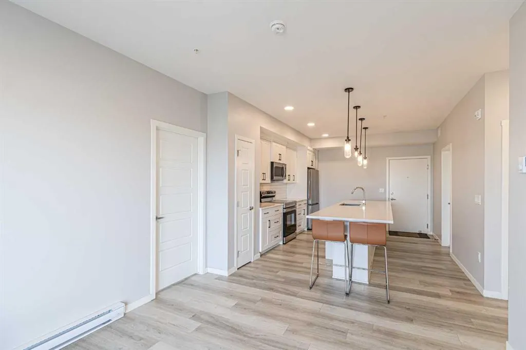 360 Harvest Hills Way NE, #203
