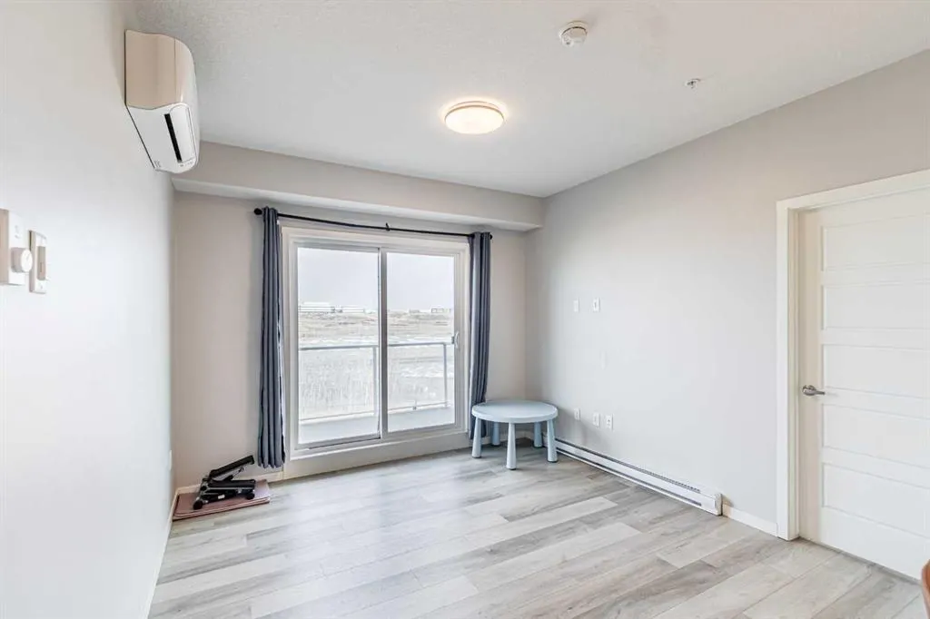 360 Harvest Hills Way NE, #203
