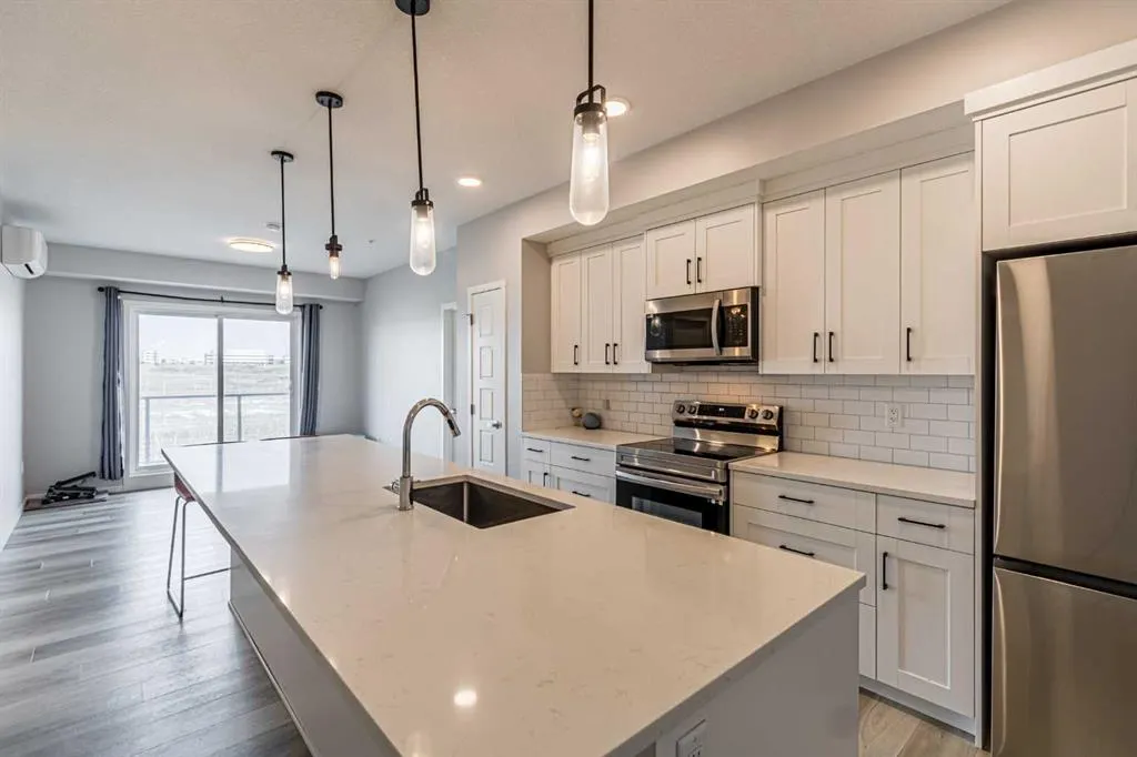 360 Harvest Hills Way NE, #203