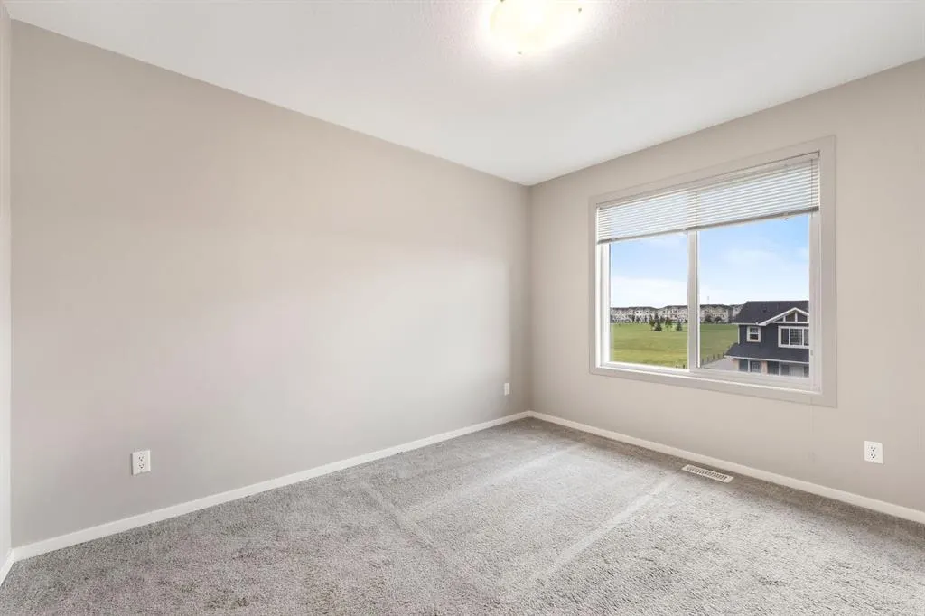 335 Redstone Walk NE, #203