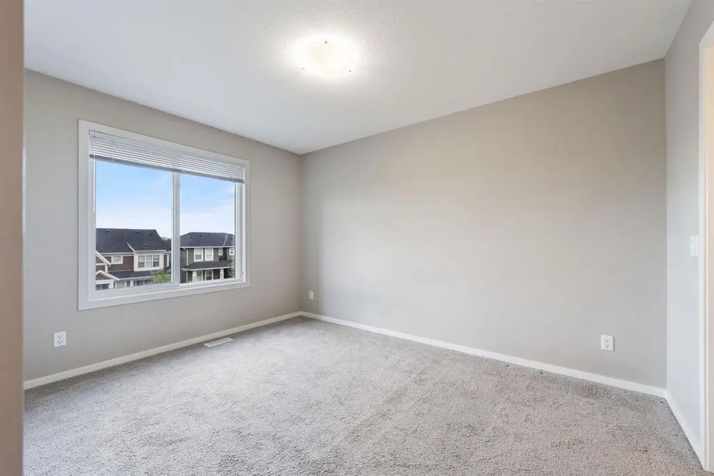 335 Redstone Walk NE, #203
