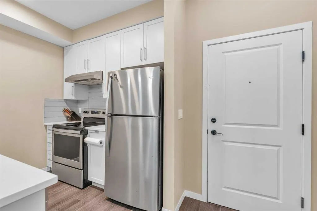 20 Mahogany Mews SE, #104