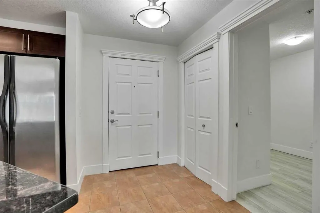 500 Rocky Vista Gardens NW, #103