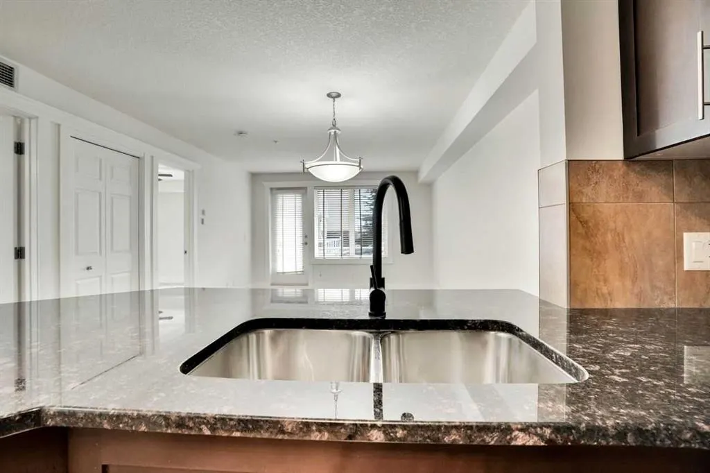 500 Rocky Vista Gardens NW, #103