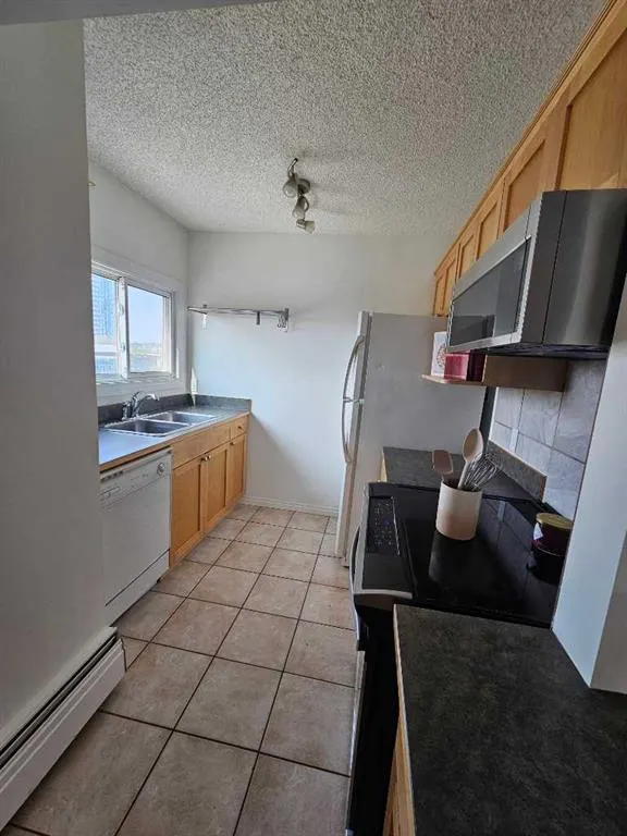 1334 12 Avenue SW, #704