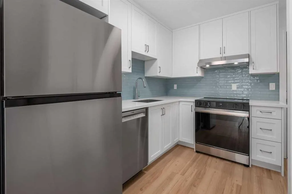 611 67 Avenue SW, #202