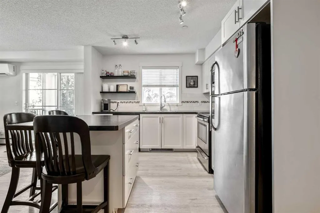 279 Copperpond Common SE, #1306