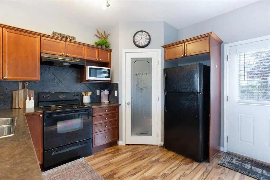 703 Luxstone Square SW, #404