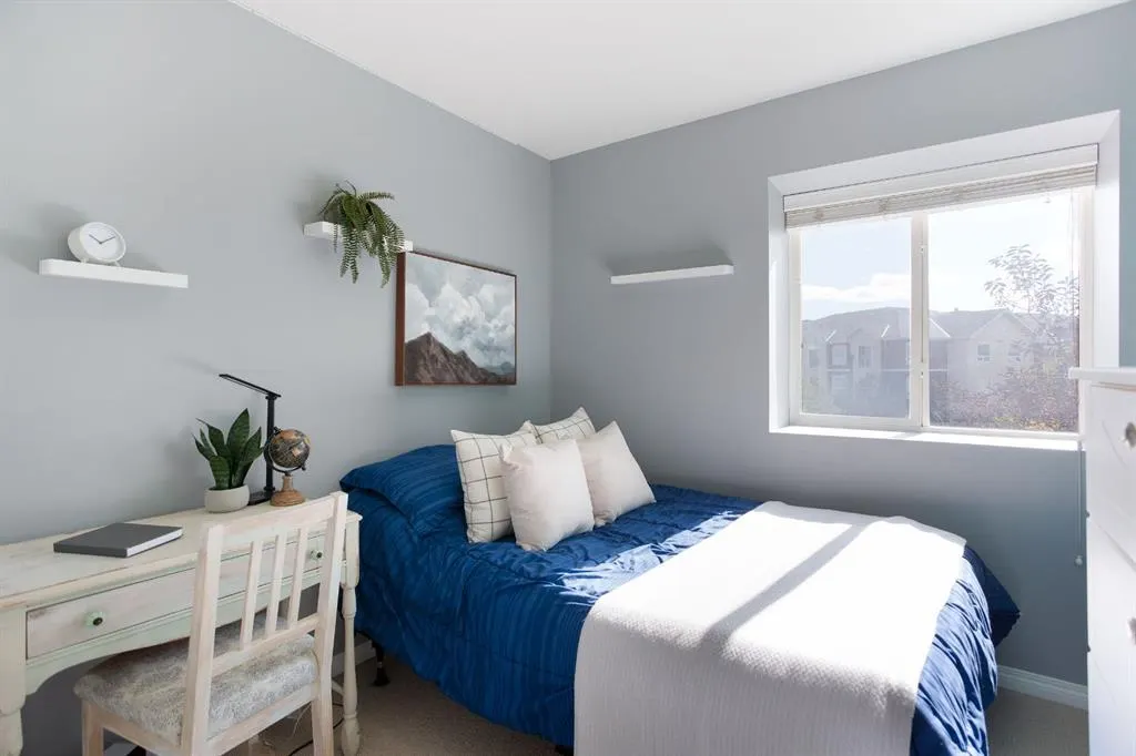 703 Luxstone Square SW, #404