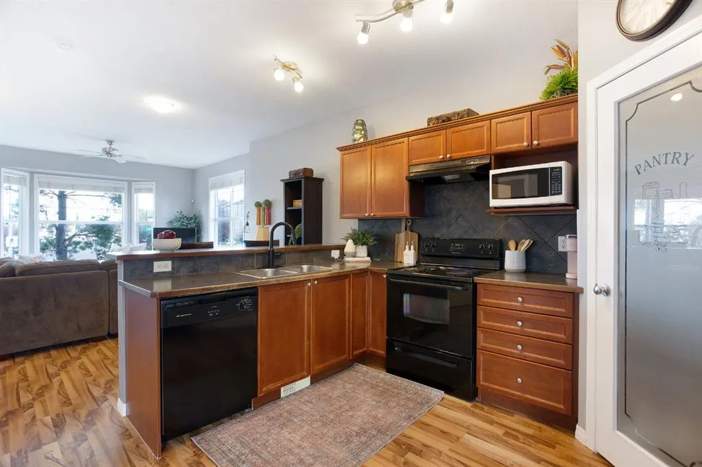 703 Luxstone Square SW, #404