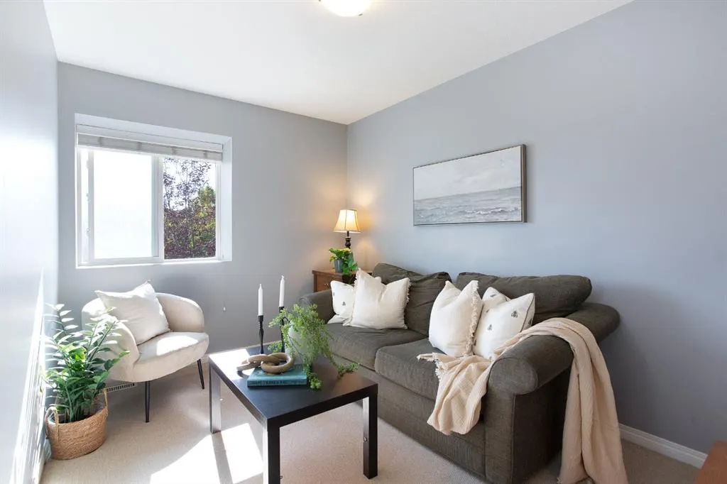 703 Luxstone Square SW, #404