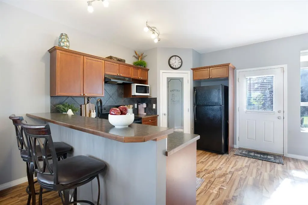 703 Luxstone Square SW, #404