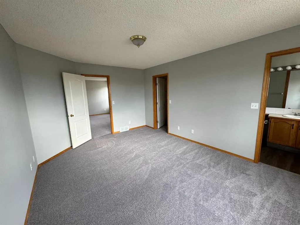 22 Arbour Butte Road NW