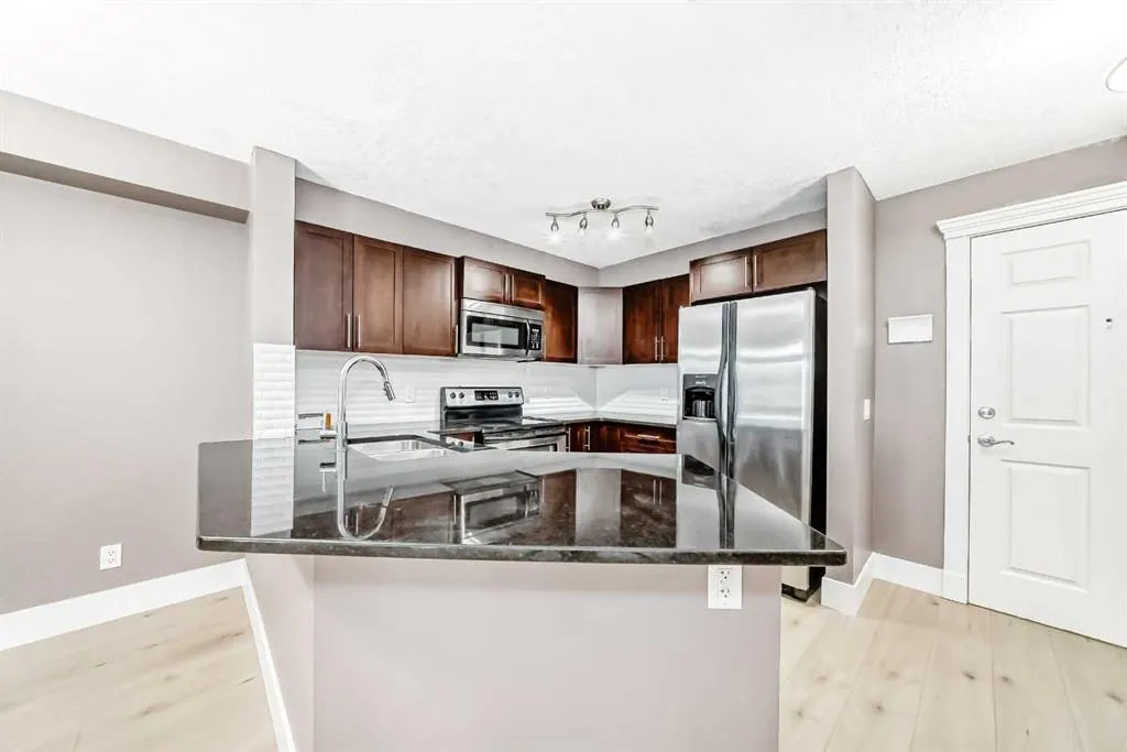 500 Rocky Vista Gardens NW, #207