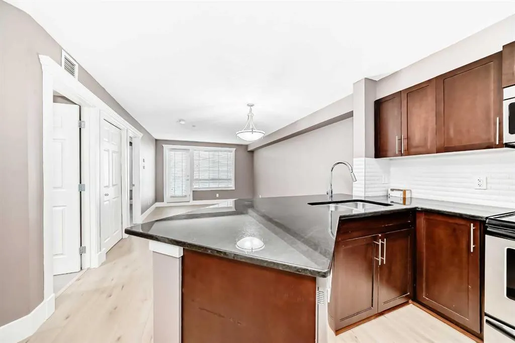 500 Rocky Vista Gardens NW, #207