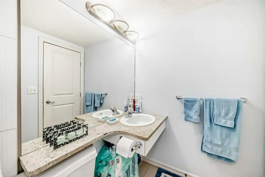 7716 bowness Road NW