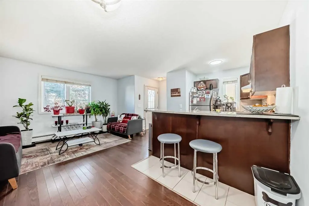 7716 bowness Road NW