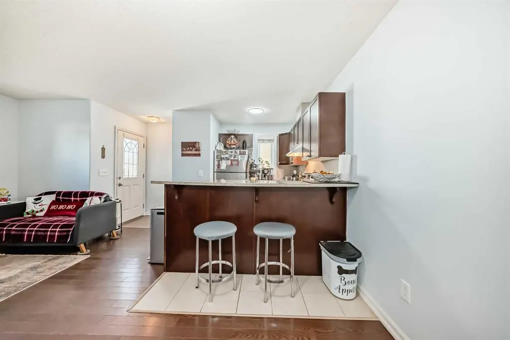 7716 bowness Road NW