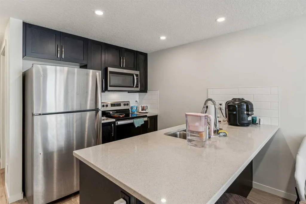 260 Rowley Way NW #312