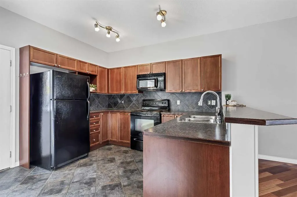 703 Luxstone Square SW #101