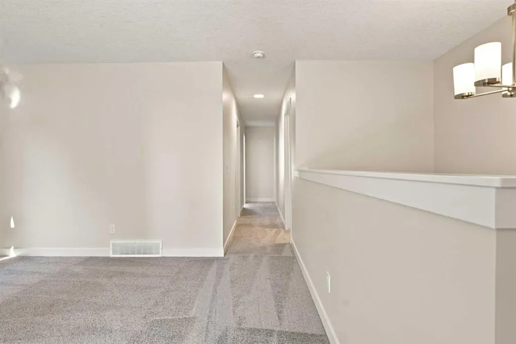 76 Buffaloberry Manor SE