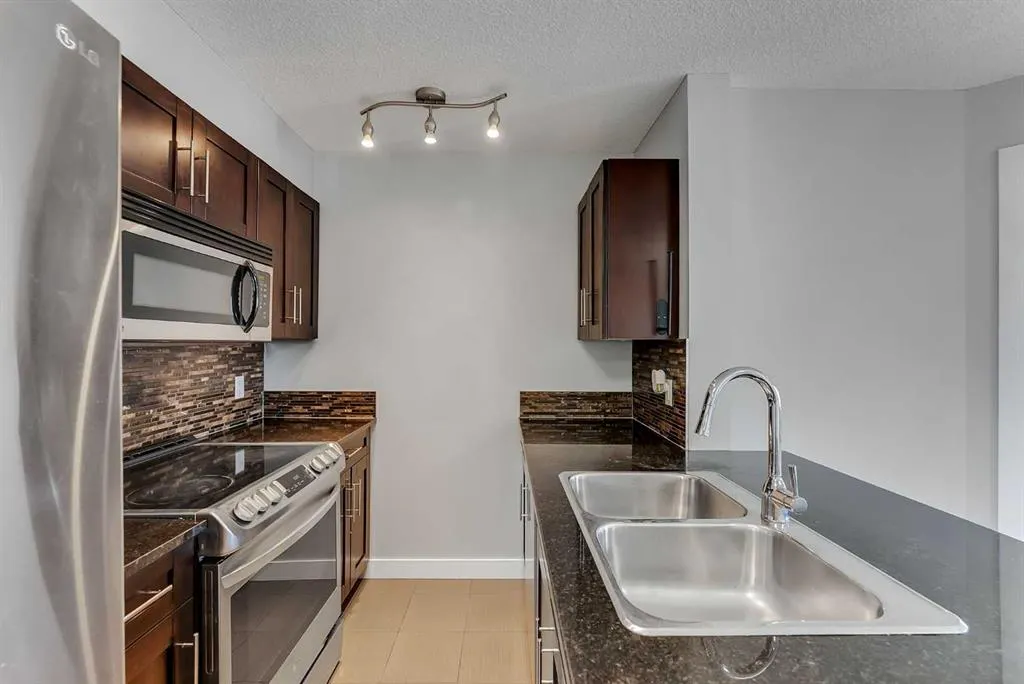 403 Mackenzie Way SW #2402