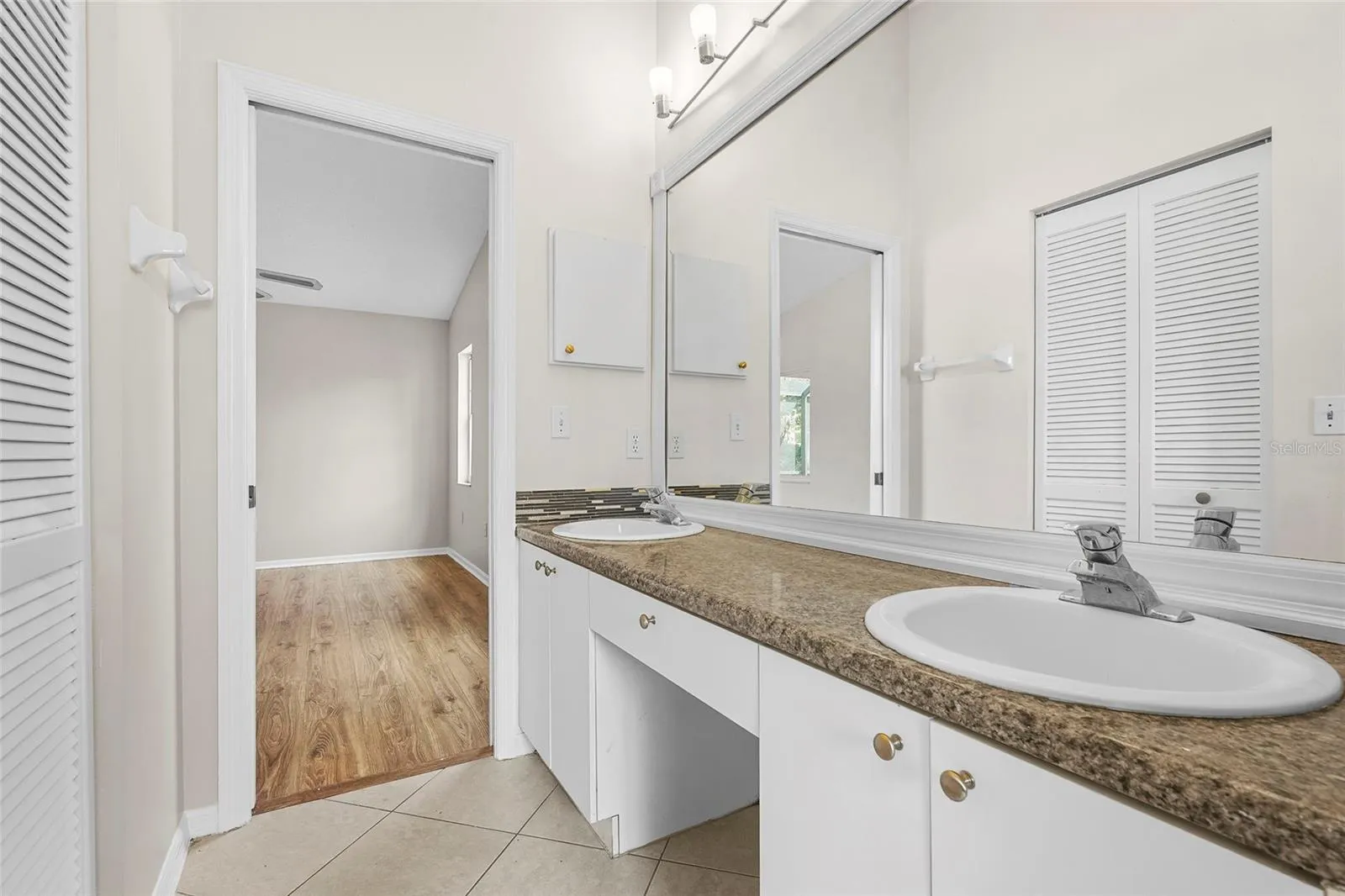 7710 33RD LN E