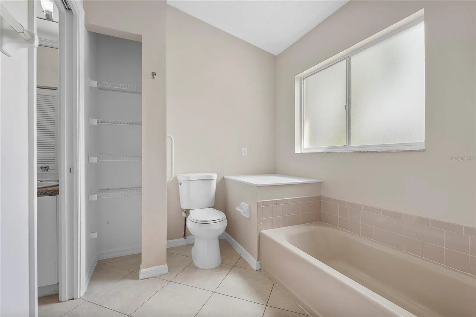 7710 33RD LN E