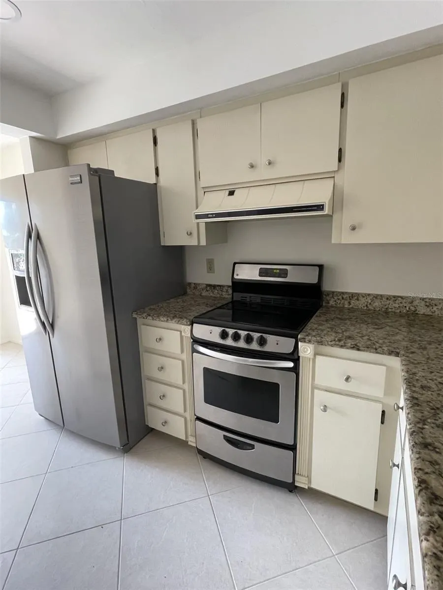 7030 W COUNTRY CLUB DR N #128, #128