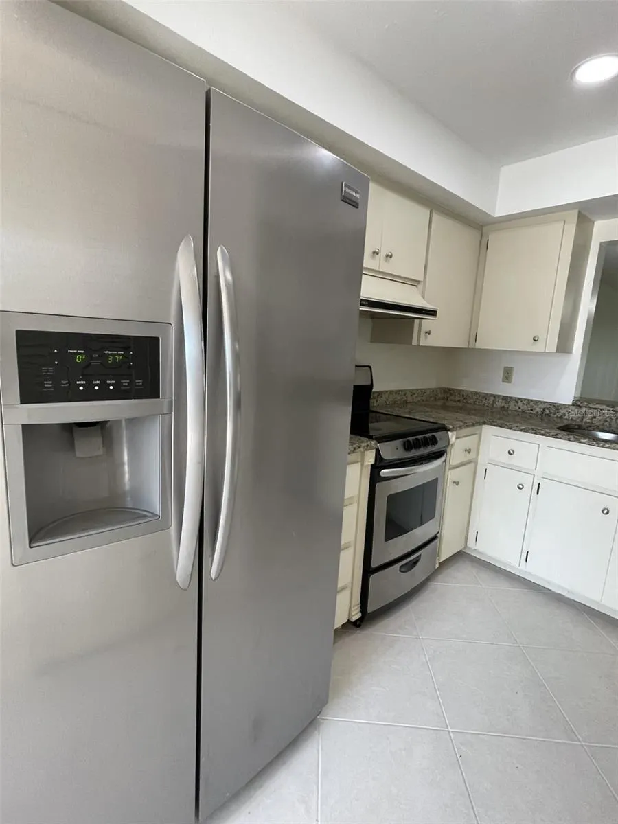 7030 W COUNTRY CLUB DR N #128, #128