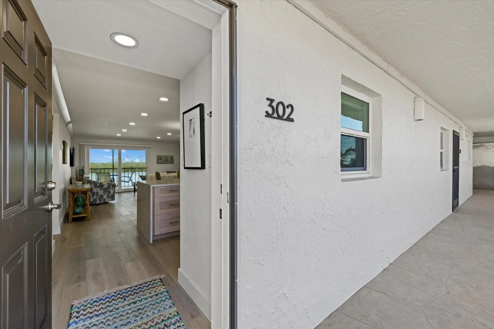 9393 MIDNIGHT PASS RD #302 #302