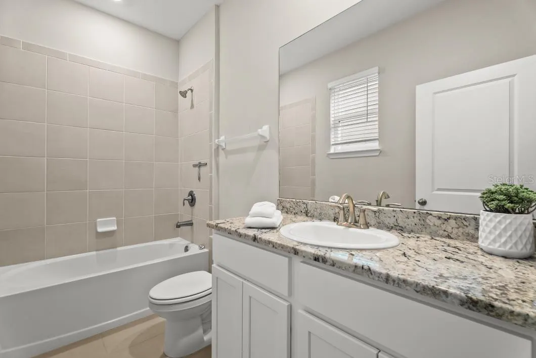 5728 WOODLAND SAGE DR