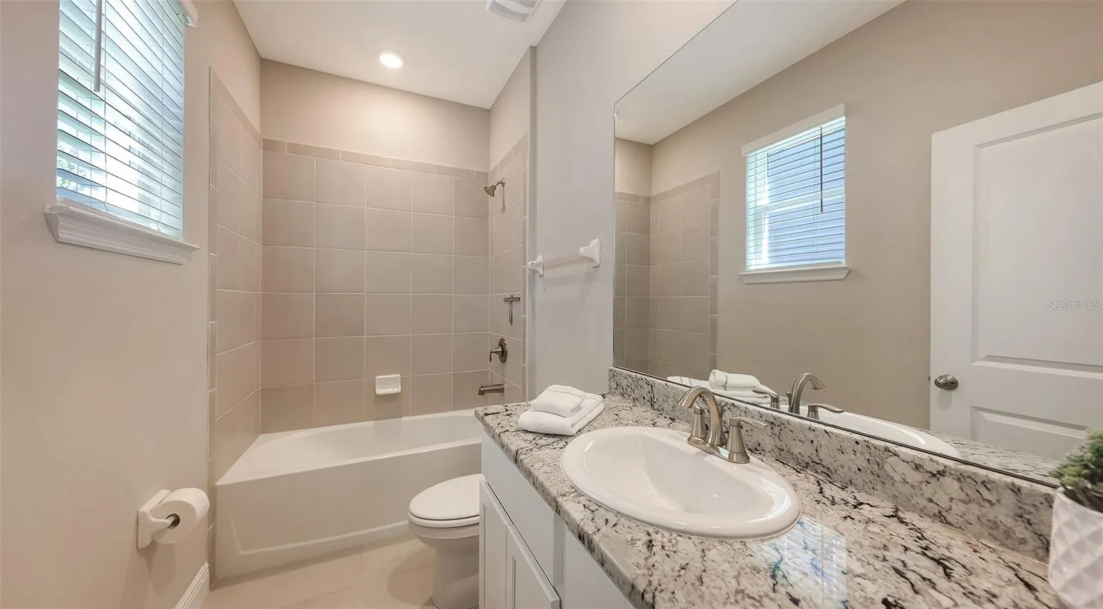 5728 WOODLAND SAGE DR